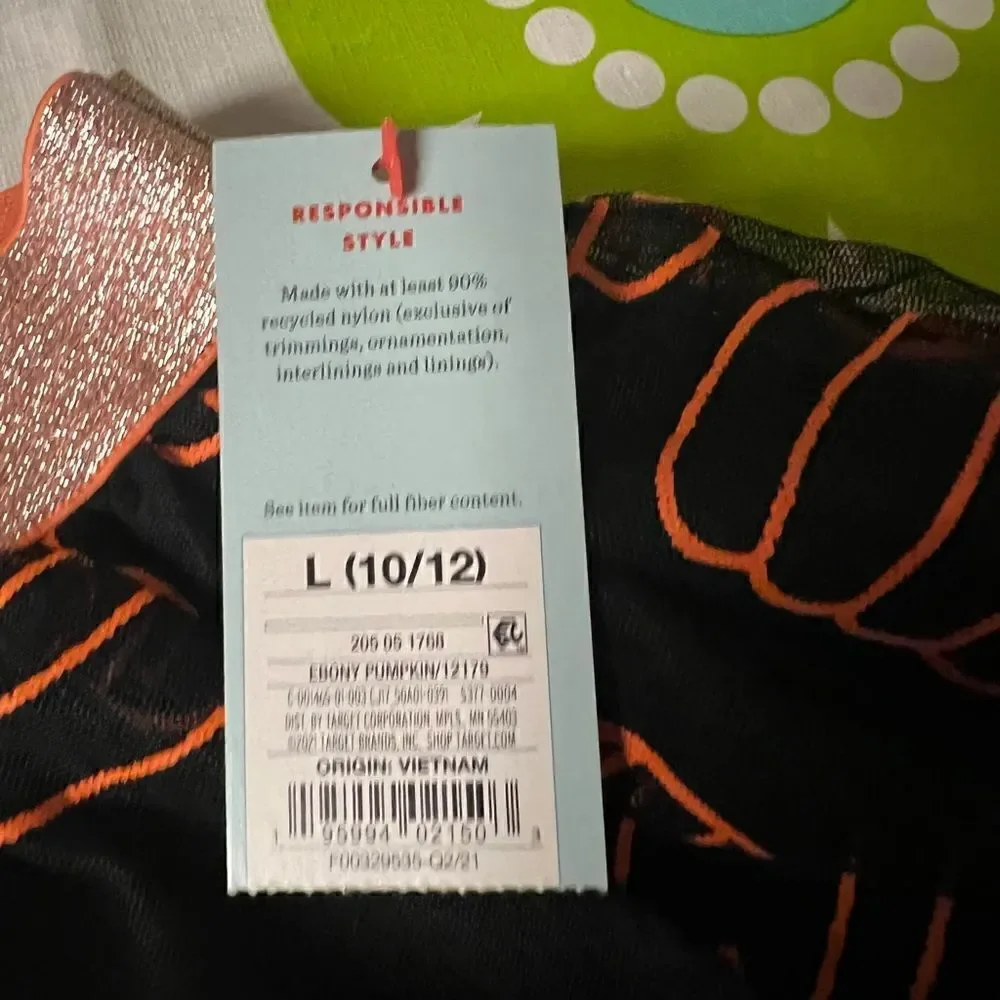 Black tutu orange pumpkins adorn this adorable fall Cat & Jack skirt